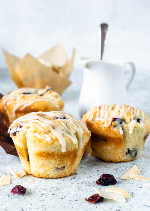 coconut and cranberry muffins with maple glaze