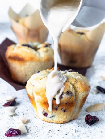 Coconut and Cranberry muffins with maple glaze