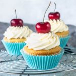Cherry Cupcakes with cherry pastry cream filling and white chocolate cream cheese frosting