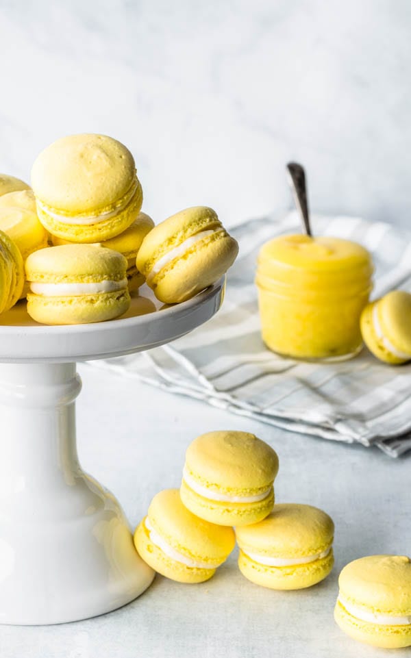 Lemon macarons in a cake stand lemon curd