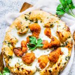 Sourdough Pizza crust with buffalo cauliflower and blue cheese sauce