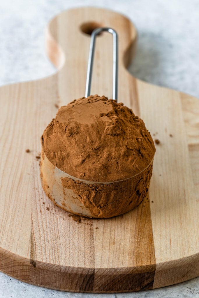 cocoa powder in a measuring cup.