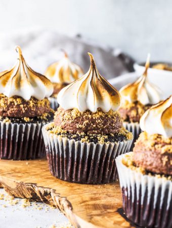 Vegan S'mores Cupcakes on a wooden board