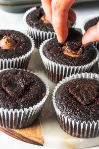 placing the top of the cupcake back on, after filling the cupcake
