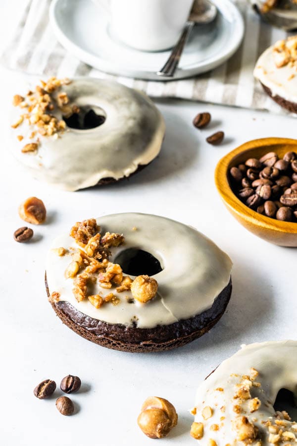 vegan donuts with coffee glaze and caramelized nuts