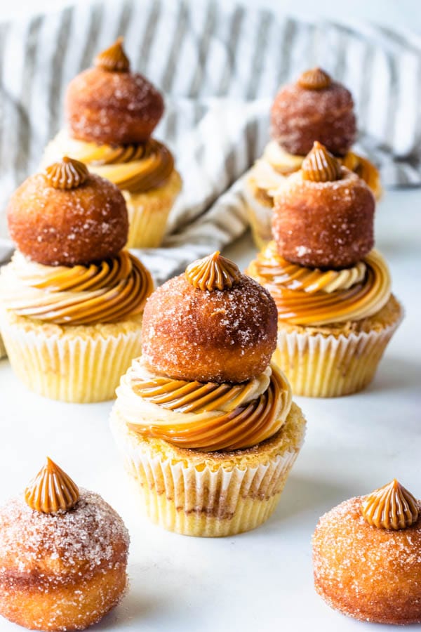 dulce de leche cupcakes with donut holes on top