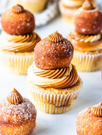 dulce de leche cupcakes with donuts on top