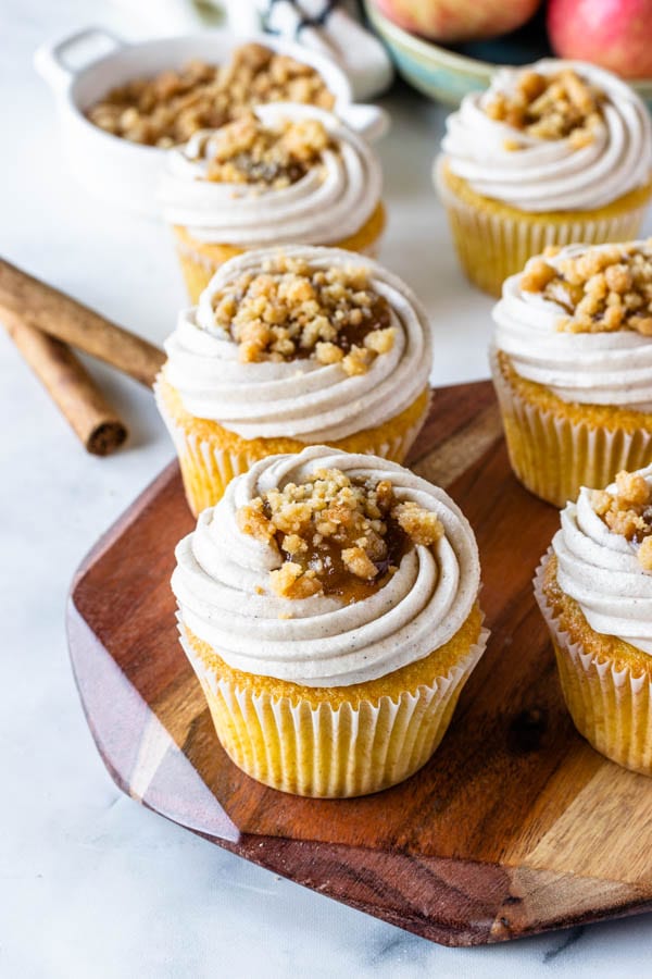 Apple Crisp Cupcakes with cinnamon cream cheese frosting, filled with apple pie filling