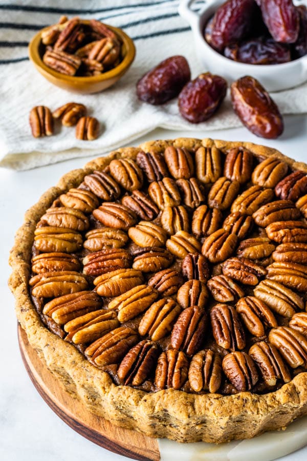 Vegan Pecan Pie also paleo, refined sugar free, covered with pecans, made with dates