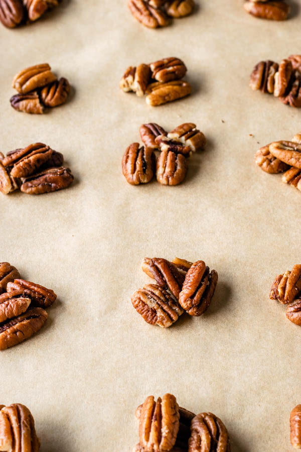 pecans on top of a baking sheet