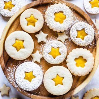 Passion Fruit Cookies filled with passion fruit curd, dusted with powdered sugar