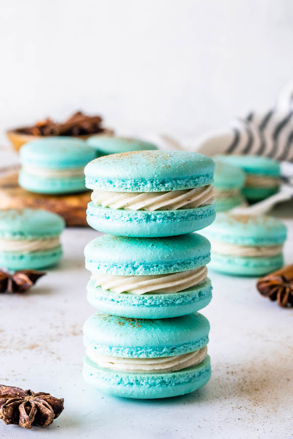 stack of blue chai macarons dusted with chai spice
