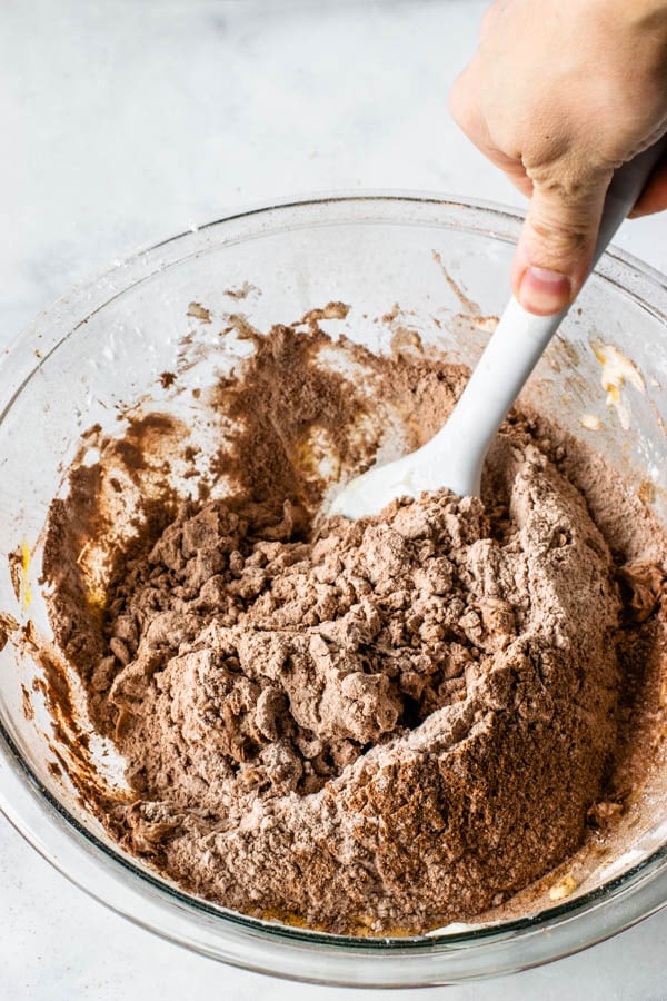 mixing dry ingredients to make chocolate tart dough
