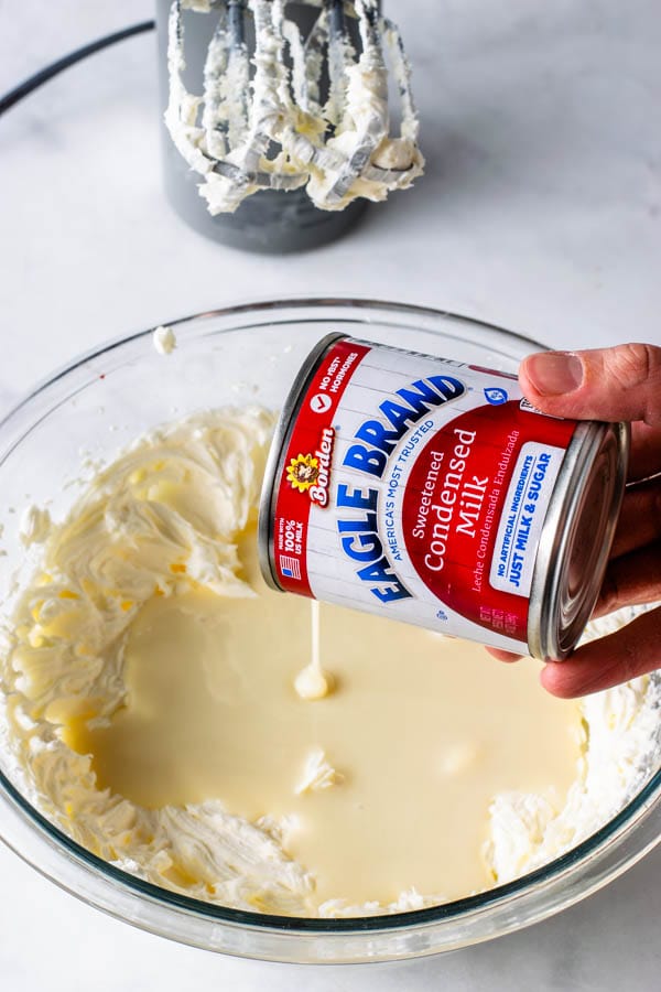 adding condensed milk to cream cheese to make no bake cheesecake