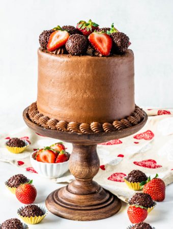 Strawberry Nutella Cake with strawberries and truffles on top