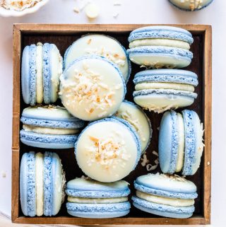 Coconut Macarons topped with white chocolate and toasted coconut