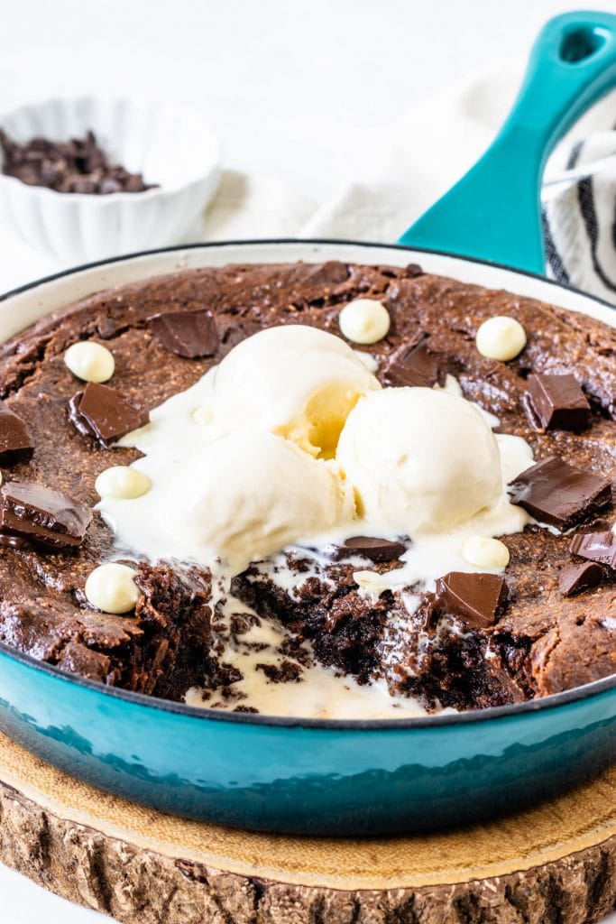 vegan brownie topped with ice cream