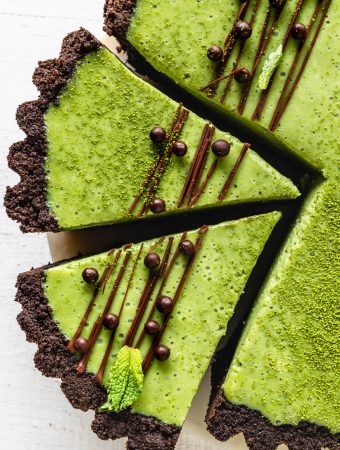 Matcha Pie with oreo crust and drizzled with chocolate and callebaut crispearls