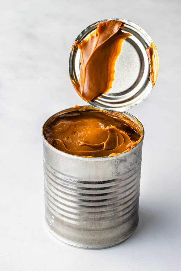 slow cooker dulce de leche made out of a can of condensed milk.