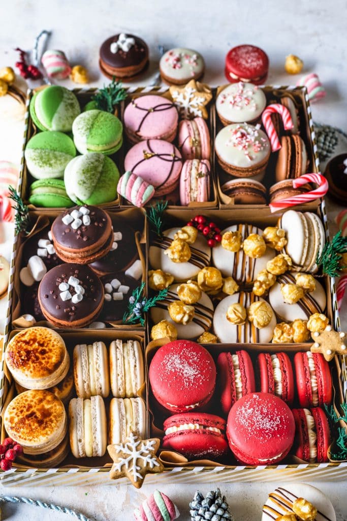 assorted holiday macarons in a box.