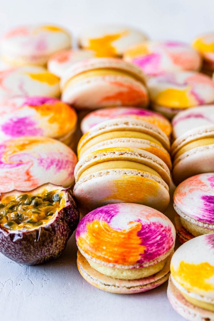 Passionfruit Macarons with Passionfruit Ganache and tie dye shells.