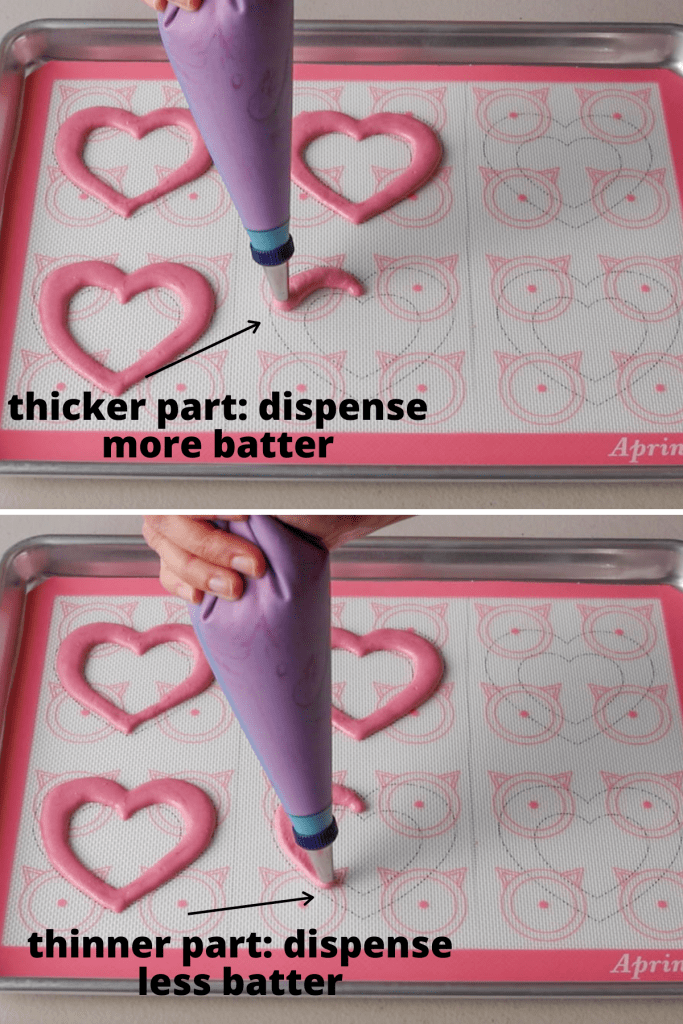 picture showing how to pipe hearts with macaron batter.