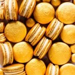 Gold Macarons filled with Baileys Ganache.