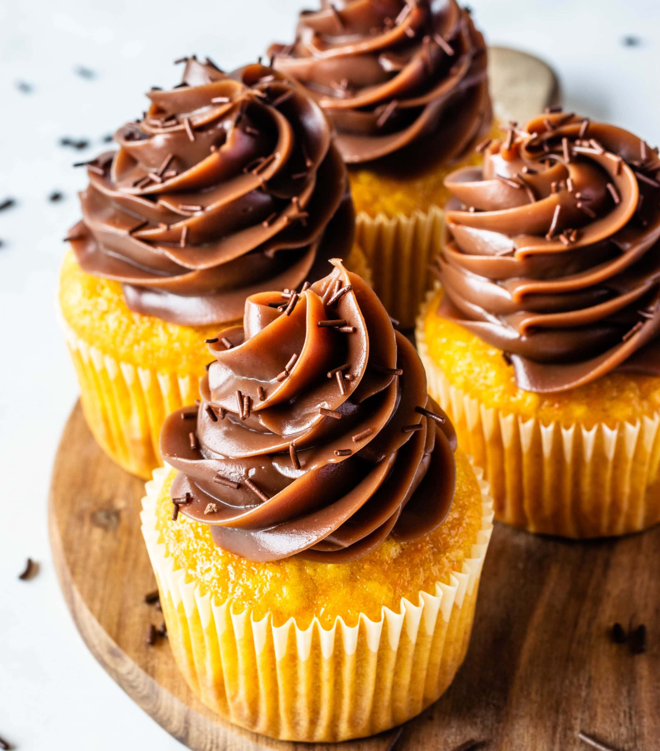 Carrot cupcakes topped with brigadeiro.