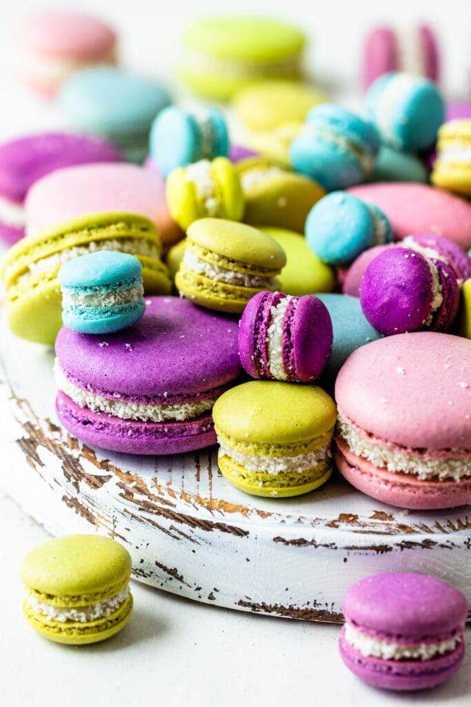 coconut fudge macarons in all different colors, green, blue, purple, pink.