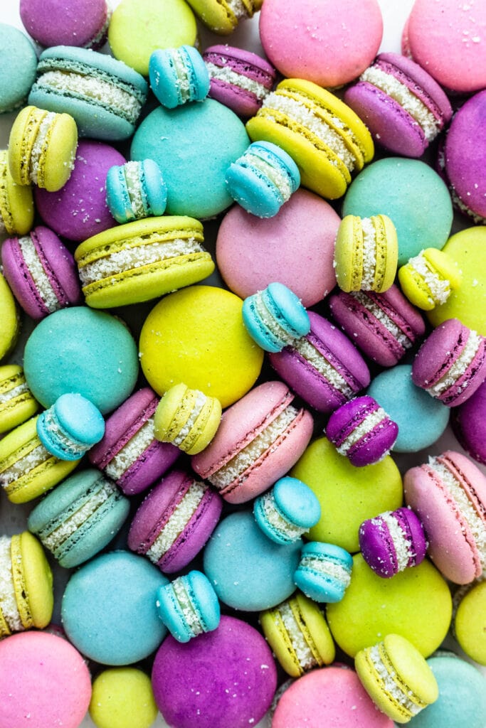 coconut fudge macarons in all different colors, green, blue, purple, pink.