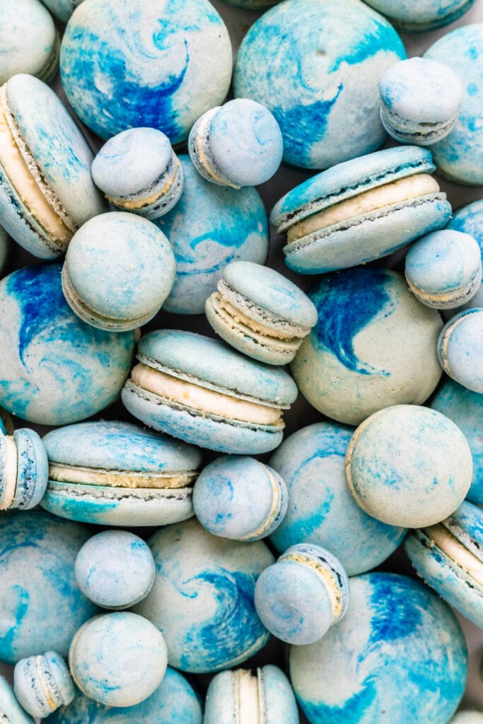 colorful macarons, pink, blue, teal, yellow.