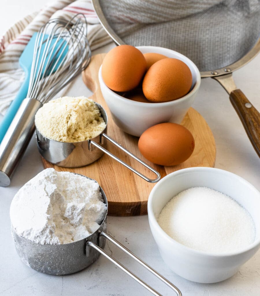 eggs, almond flour, powdered sugar, and granulated sugar.