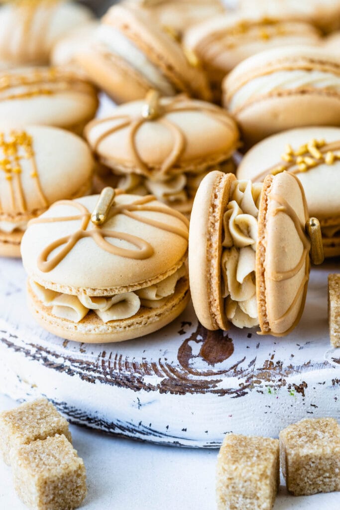 Brown Sugar Macarons topped with golden decorations.