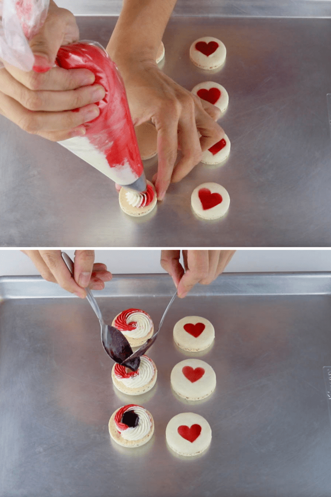 filling macarons decorated with a heart on top using a bicolor frosting, and also jam in the middle.
