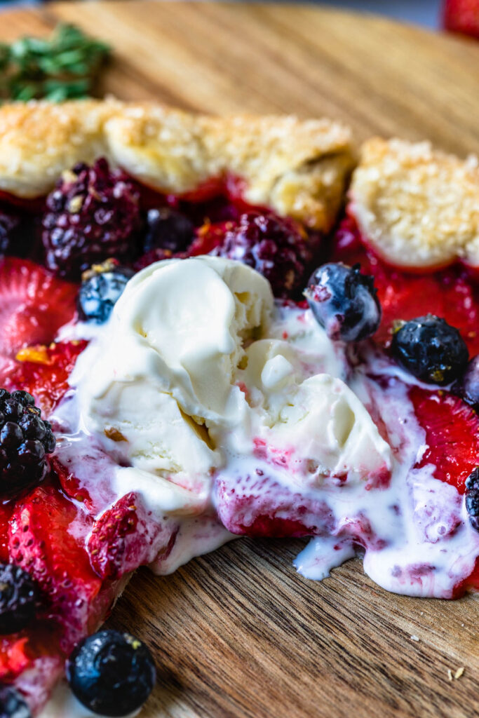Mixed Berry Galette with ice cream on top.