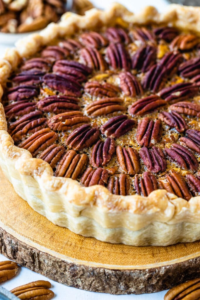 pecan pie photographed at a 45 degree angle.