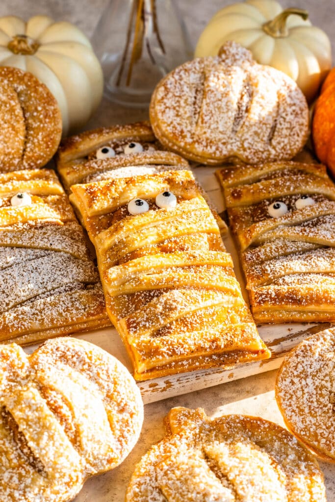 pastries shaped like mummy filled with pumpking filling.