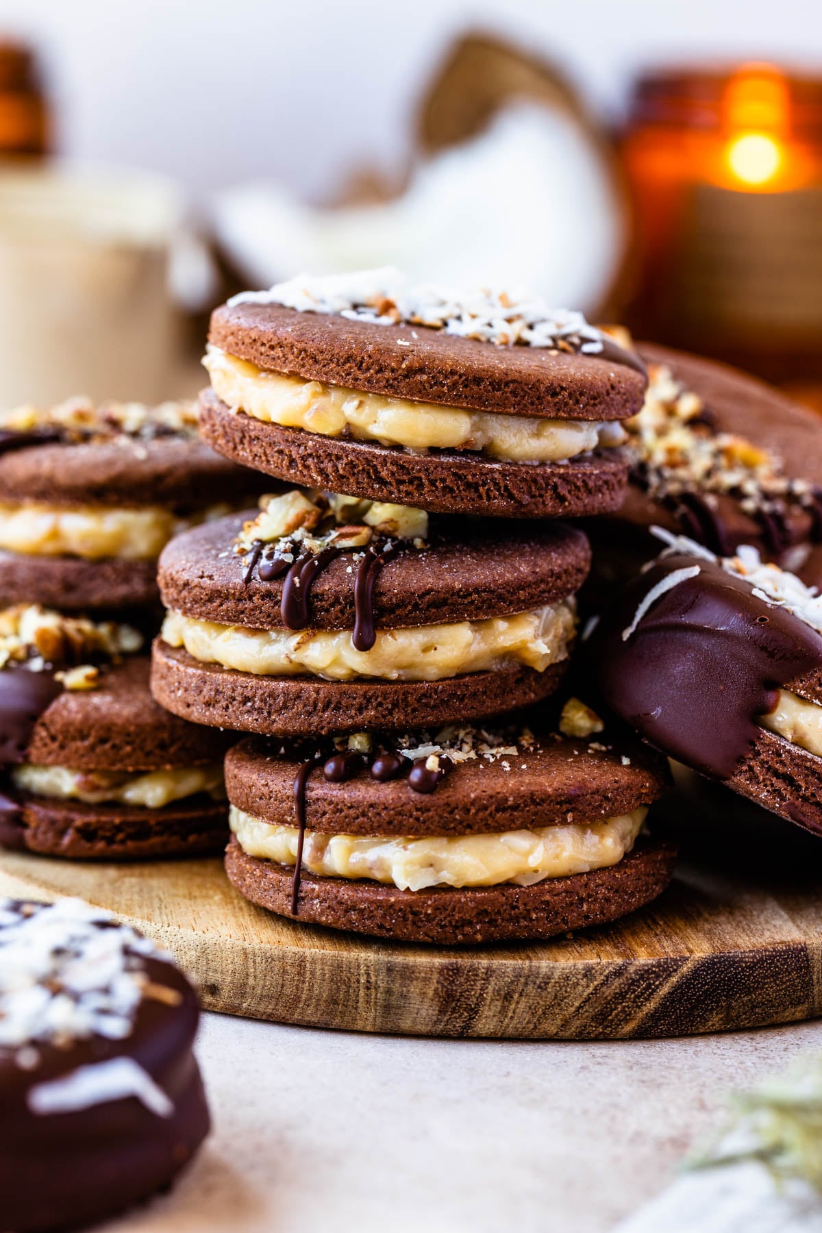 german chocolate cookies with coconut or chopped pecans on top.