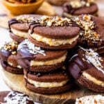 german chocolate cookies with coconut or chopped pecans on top.