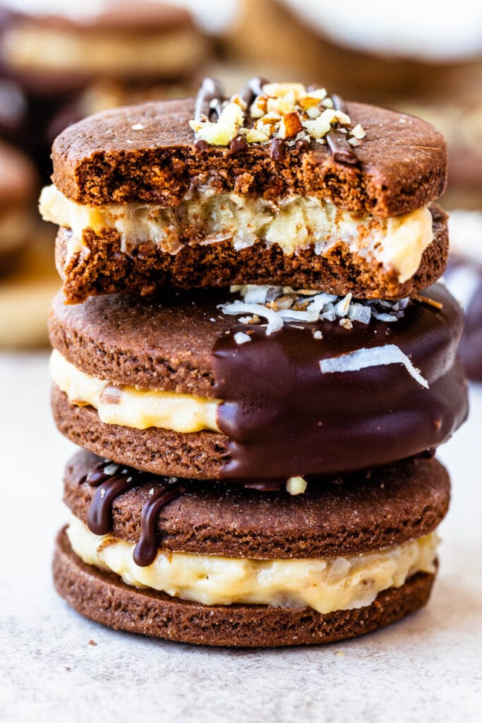 stacked chocolate cookies with coconut filling.