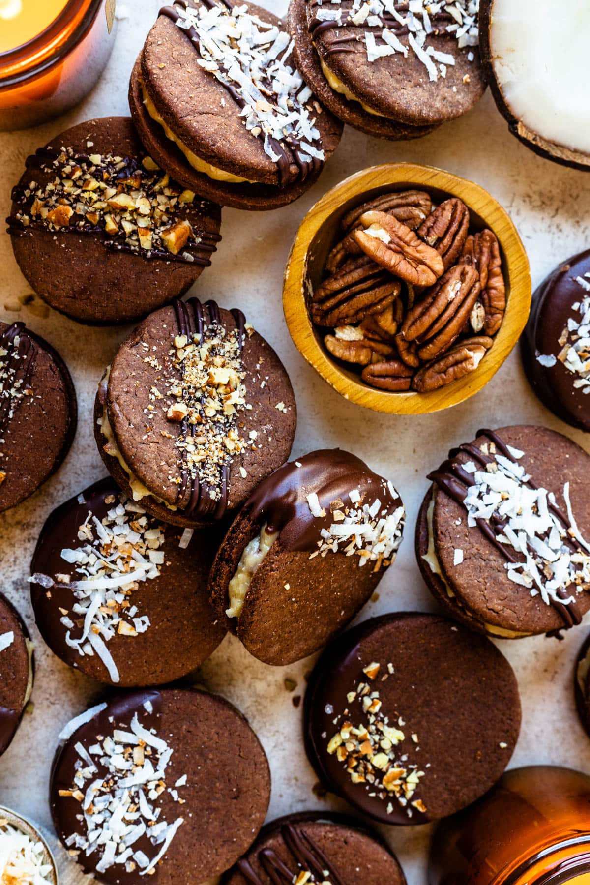 german chocolate cookies with coconut or chopped pecans on top.