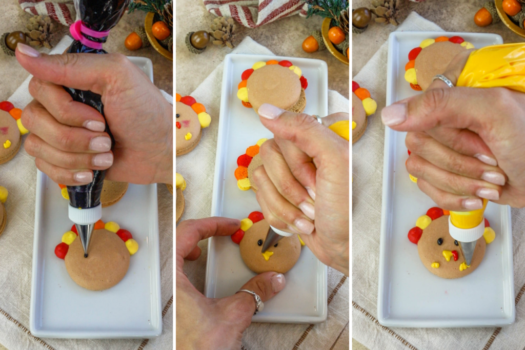 decorating turkey macarons with royal icing, drawing the eyes, the beak, and the feet.