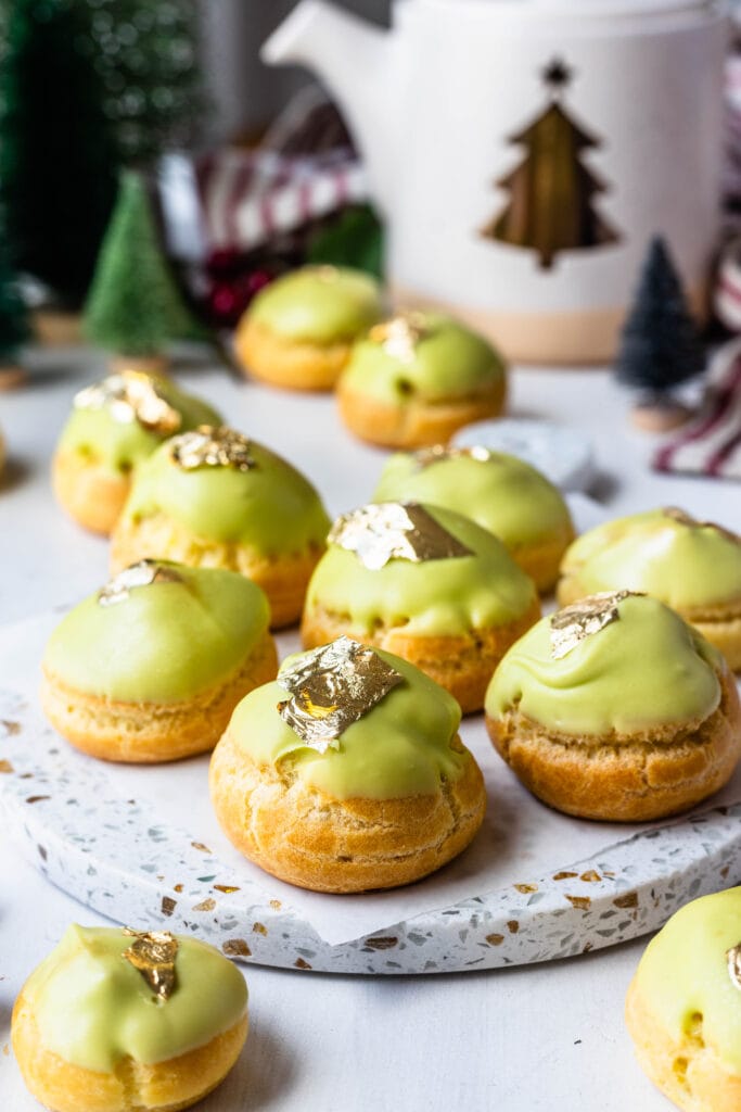 choux pastry dipped in green white chocolate.