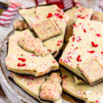 peppermint bark chopped on top of a board.
