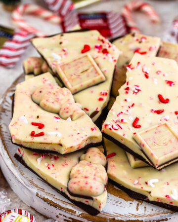 peppermint bark chopped on top of a board.
