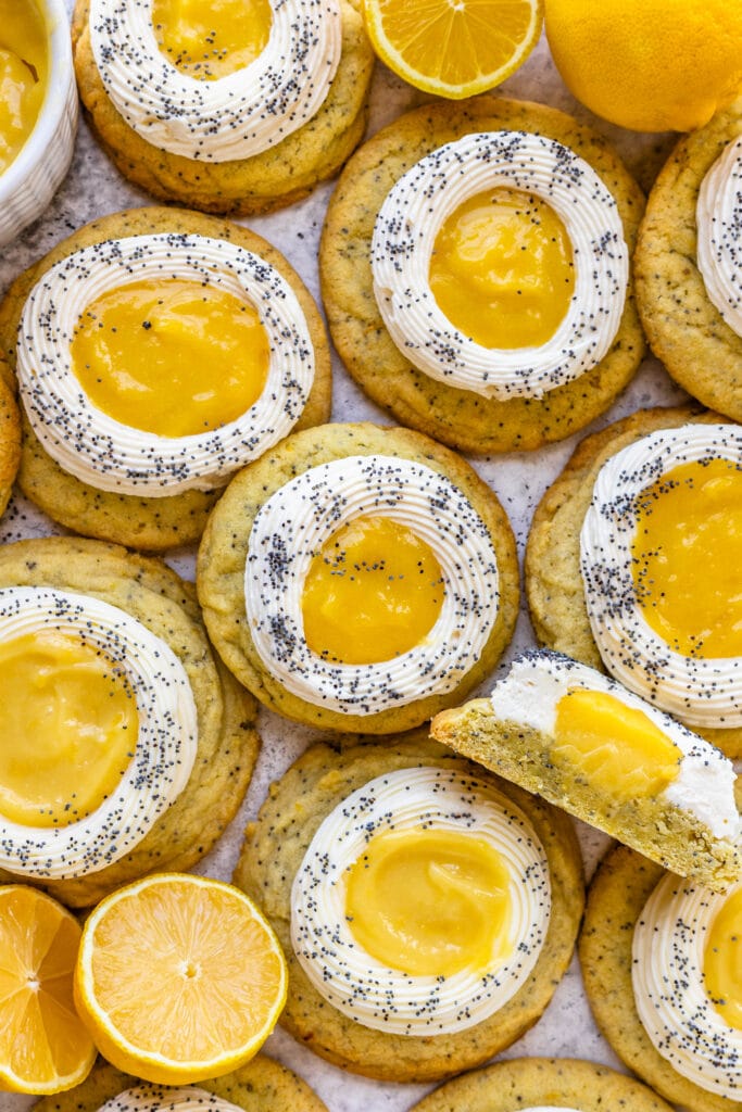Lemon Poppy Seed Cookies topped with lemon curd and cream cheese frosting.