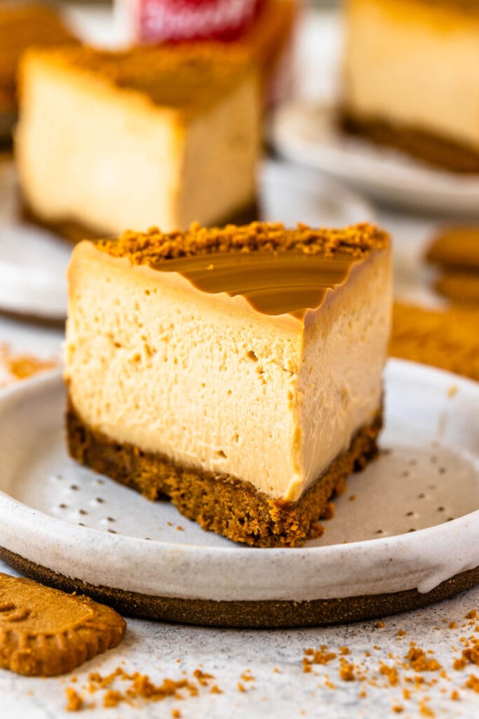 slice of biscoff cheesecake on a plate.
