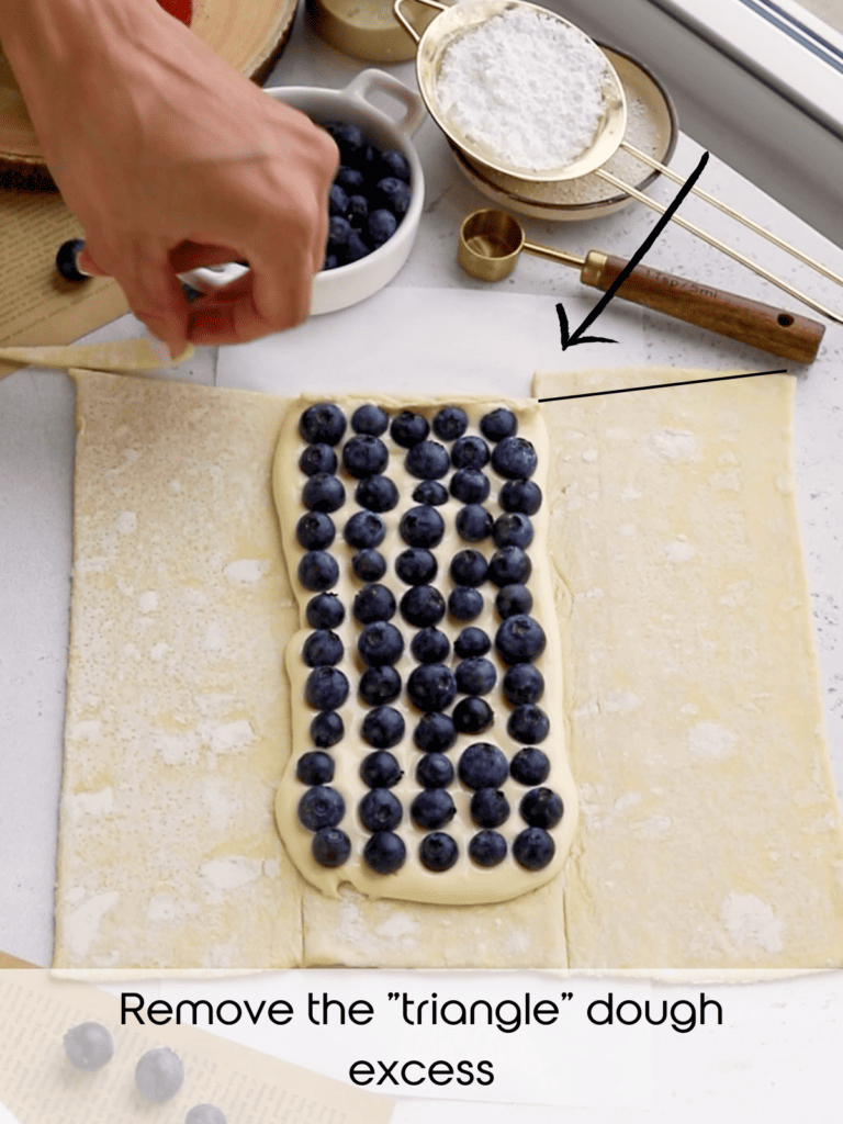 removing the triangle dough on top of the pastry.