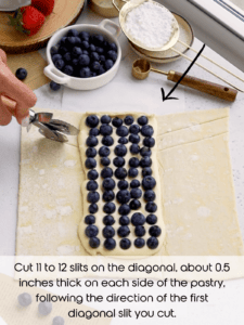 cutting 11 to 12 slits on the diagonal, about 0.5 inches thick on each side of the pastry filling.
