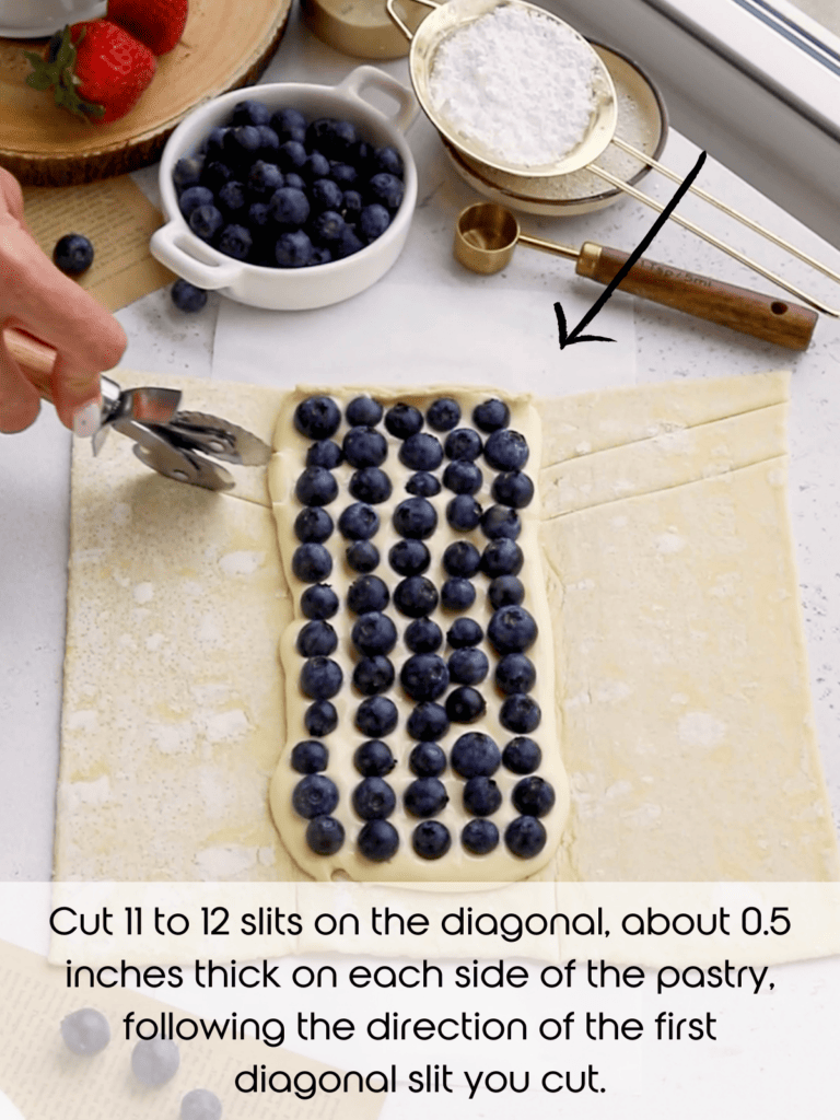 cutting 11 to 12 slits on the diagonal, about 0.5 inches thick on each side of the pastry filling.